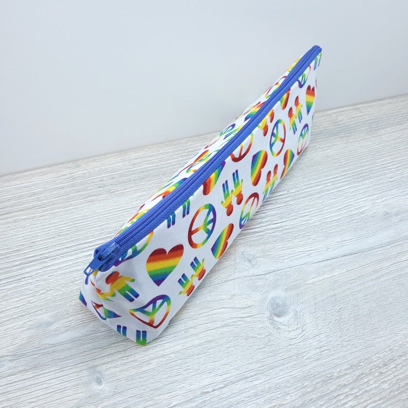 Peace, love and pride pencil pouch.