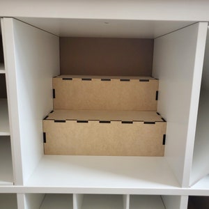 2 tier display unit in kallax cube shelf.