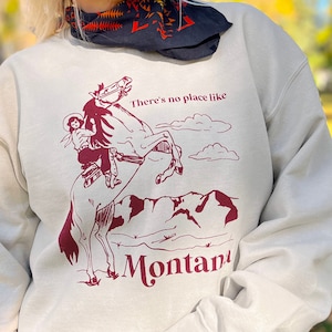 Cozy Crew Neck Sweatshirt - No Place Like Montana- Cowgirl on Horse Red Screen Print