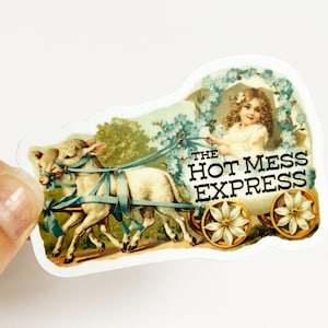 May include: A vintage illustration of a girl riding in a carriage pulled by two white lambs. The carriage is decorated with blue flowers and the text "THE HOT MESS EXPRESS".