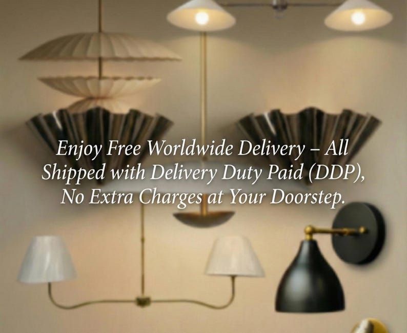 May include: A collection of wall-mounted and hanging light fixtures featuring various designs, including pleated shades, conical metal shades, and brass-toned arms. The lighting fixtures are arranged in a group, showcasing different shapes and finishes.