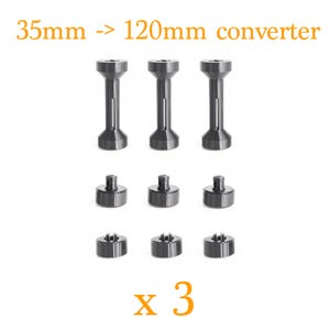 Op de afbeelding: Een set van drie 35mm naar 120mm converterstukken. De afbeelding toont drie hoge, cilindrische stukken en zes kleinere, ronde stukken. De tekst "35mm -> 120mm converter" staat bovenaan en "x 3" onderaan.