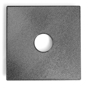 May include: A square, dark gray object with a textured surface and a circular hole in the center. The object has a diagonal pattern across its surface. The hole is white and appears to go all the way through the object.