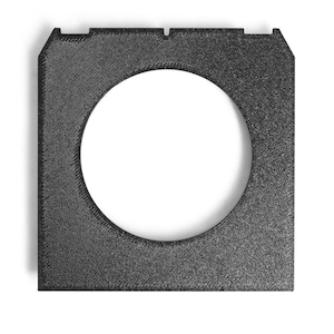 May include: A square, black, textured frame with a large, circular aperture in the centre. The frame has a matte finish and a slightly rough texture. The design includes small notches on two of the corners.