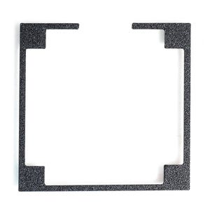 May include: A black, textured metal frame with a square shape and cut-out corners. The frame has a matte finish and is set against a white background. The design features extended tabs at the top.
