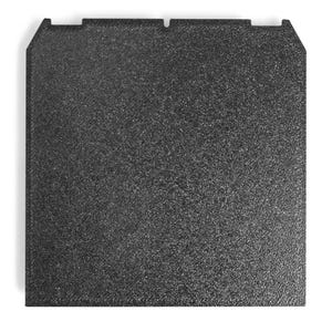 May include: A square, dark gray object with a textured surface. The object has a slightly beveled edge and two small cutouts on one side. The overall appearance is matte and industrial.