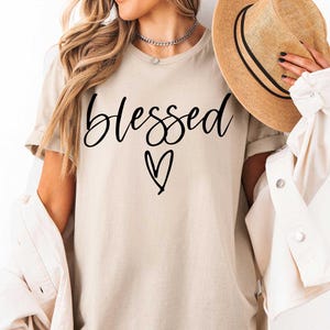 May include: A rustic wooden sign with the text "Welcome to our home" in white lettering. The sign features a distressed finish and a simple, inviting design, perfect for entryway decor.