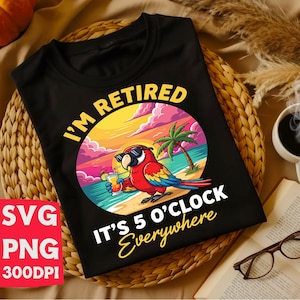 May include: Black t-shirt with a parrot design. The parrot is wearing sunglasses and holding a cocktail on a beach scene. Text reads "I'M RETIRED IT'S 5 O'CLOCK Everywhere". The design is set against a sunset backdrop.