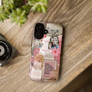 May include: A phone case featuring a collage of Dolly Parton imagery, including photographs of the singer, a butterfly, flowers, and cowboy boots. The design incorporates musical notes, pink floral accents, and text quotes including Tumble out of bed and I stumble to the kitchen pour myself a cup of ambition.