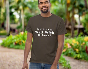 Drinks Well With Others Shirt • Funny Drinking Tee • Party Humor T-Shirt for Men & Women • Alcohol Gift Idea