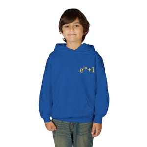 May include: A blue hoodie with a front pocket and a hood. The hoodie has the mathematical formula "e^iπ+1" printed in yellow on the upper chest. The person in the image is wearing blue jeans.