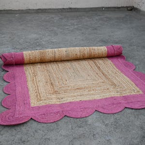 May include: A white ceramic mug with a black handle and the text "But First, Coffee" in a handwritten style. The mug is on a white surface. The mug is 4 inches tall.