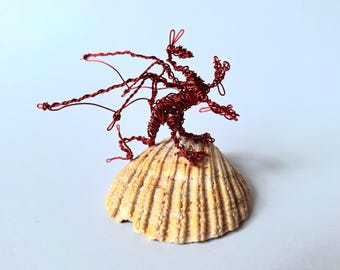Little Welsh dragon on an mount sketched in 3D with repurposed electrical wire