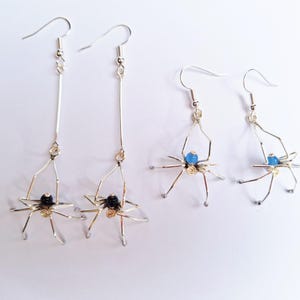 Single pair of Spider earrings with or without extra drop
