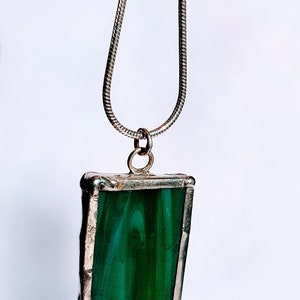Green stained glass pendant on chain length 14-20". Handmade in Scotland, each piece individual and unique.
