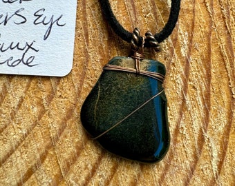 Black Tigers Eye pendant on faux suede necklace