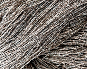 Suri Llama/ Finnsheep  DK yarn 220 yds.  2 ply Dark gray natural.