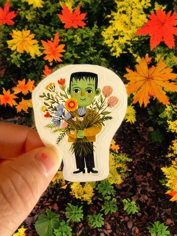 Frankenstein Holding Wildflower Bouquet Sticker, Cute Halloween Stickers for Laptops, Journals, and More