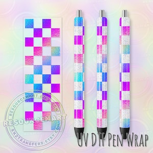May include: Three pens with a checkerboard pattern in shades of blue, pink, purple, and white. A matching rectangular design is to the left. The text "UV DTF PEN WRAP" is at the bottom of the pens.