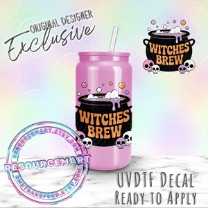 May include: A pink tumbler with a straw, featuring a "Witches Brew" design in black and orange. The design includes a cauldron, skulls, and the text "Original Designer Exclusive". The image also includes the text "UVDTF DECAL READY TO APPLY".