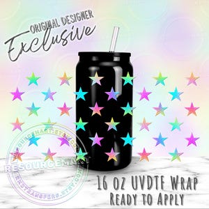 May include: A black 16 oz UVDTF wrap with a star design. The wrap features a pattern of colorful stars in shades of pink, blue, yellow, and green. The words "Original Designer Exclusive" are above the wrap.