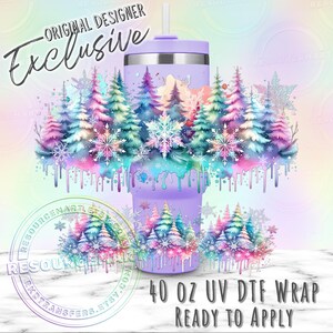 May include: A 40 oz UV DTF wrap, ready to apply, featuring a winter forest design. The design includes colorful trees, snowflakes, and a unicorn, with the words "ORIGINAL DESIGNER Exclusive". The tumbler is lavender.