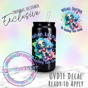 May include: Black tumbler with a straw featuring a colorful voodoo doll design and the text "when karma is taking too long." The design includes a voodoo doll with a heart and a pin. The image also includes the text "UVDTF DECAL READY TO APPLY."