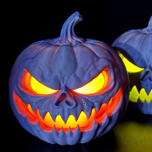 Glowing Halloween Pumpkin – Spooky LED Jack-O'-Lantern, Changeable Eye Color