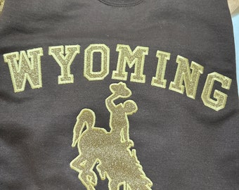 Officially Licensed University of Wyoming crewneck washable Glitter Sweatshirt