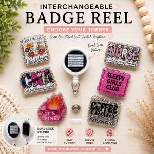 May include: An interchangeable badge reel with a white plastic housing and a central dual lock velcro attachment. Six decorative toppers are displayed, featuring various colourful designs, glitter accents, and text including Nurse, CNA, and It's Fine.