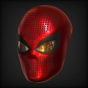 May include: A glossy red full-face mask featuring a perforated pattern across the forehead and chin areas. The mask includes two large, almond-shaped eye openings outlined in black, with reflective, metallic-toned lenses visible within them.