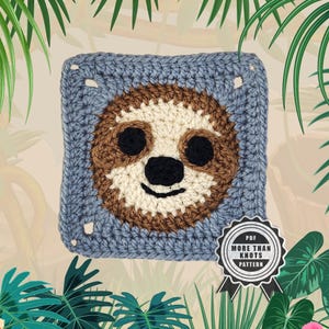 May include: A crocheted square featuring a sloth design. The sloth's face is in the center, with brown, cream, and black details. The square has a light blue border and a tag that says "PDF MORE THAN KNOTS PATTERN".
