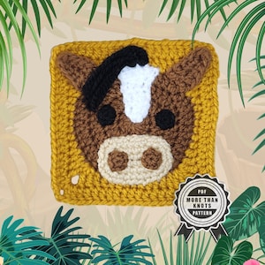 May include: A crocheted square with a horse face design. The horse has a brown body, black mane, and white blaze, set against a mustard yellow background. The design includes a beige muzzle and black eyes. A tag in the lower right corner reads "PDF MORE THAN KNOTS PATTERN".
