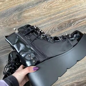 Elevate your dark aesthetic to legendary heights. Our Gothic Vampire Mid-Calf Boots are the ultimate fusion of Victorian elegance and modern punk edge. Featuring a towering 8cm+ super high wedge, these boots are engineered for those who want to dominate the room without sacrificing the comfort needed for a long night at a convention, a club, or a moonlit stroll.