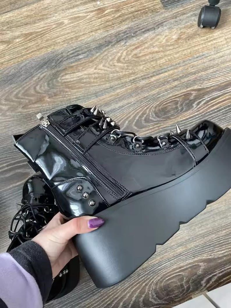 Elevate your dark aesthetic to legendary heights. Our Gothic Vampire Mid-Calf Boots are the ultimate fusion of Victorian elegance and modern punk edge. Featuring a towering 8cm+ super high wedge, these boots are engineered for those who want to dominate the room without sacrificing the comfort needed for a long night at a convention, a club, or a moonlit stroll.