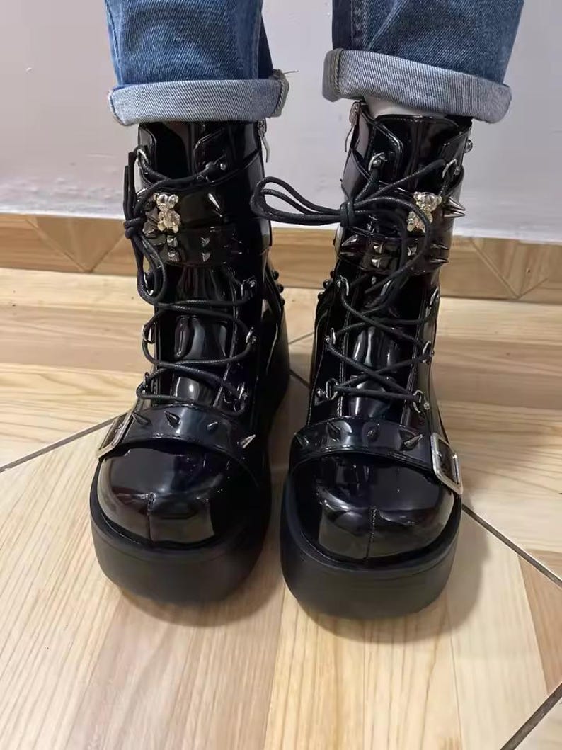 Elevate your dark aesthetic to legendary heights. Our Gothic Vampire Mid-Calf Boots are the ultimate fusion of Victorian elegance and modern punk edge. Featuring a towering 8cm+ super high wedge, these boots are engineered for those who want to dominate the room without sacrificing the comfort needed for a long night at a convention, a club, or a moonlit stroll.