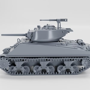 May include: A gray model of a military tank, featuring a long barrel, a rotating turret, and a machine gun on top. The tank has detailed tracks and wheels, and is set against a plain white background.