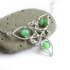 Celtic Triquetra Knot Necklace - Silver Wire Wrapped and Cat&#39;s Eye Glass Bead - CHOICE OF COLOR - Irish Jewelry Trinity Knot Symbol