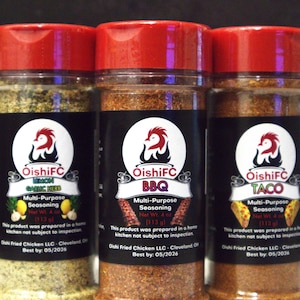 May include: Three spice jars with red lids and black labels. The labels feature a logo of a rooster and the text "OishiFC" above the flavor names: Lemon Garlic Herb, BBQ, and Taco. Each jar contains 4 oz (113 g) of seasoning.