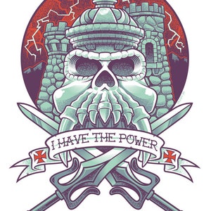May include: A vintage-style illustration of a skull with a castle on top, crossed swords, and a banner that reads "I HAVE THE POWER". The banner also includes a red cross and the text "1982" and "MATTEL".