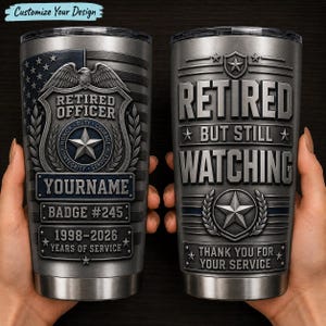 May include: A pair of stainless steel insulated tumblers. One features a police badge design with "Retired Officer" text, a star, and the years 1998-2026. The other says "Retired But Still Watching" with a star and the words "Thank You For Your Service."