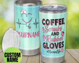 May include: Two stainless steel tumblers with lids. One features a stethoscope heart design and the text "YOURNAME". The other has the text "COFFEE, Scrubs AND Rubber GLOVES" and "#NurseLife". A clear lid is in the foreground.