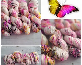 Pink Morpho ~ hand dyed superwash speckled yarn | merino wool | sport weight | 274 yards