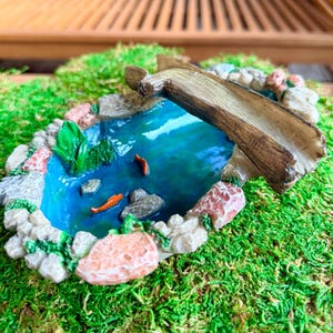 May include: A set of three ceramic mugs with a speckled, matte finish. Each mug features a different color: light blue, cream, and gray. The mugs have a simple, modern design, perfect for coffee or tea.