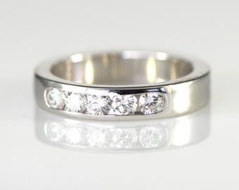 Five Stone Diamond Band .58 Carat Total Weight  in Platinum