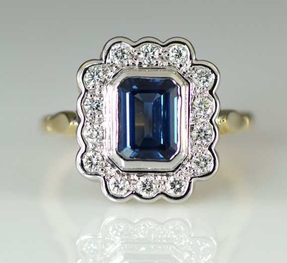 Emerald Cut Blue Sapphire Surrounded by Diamonds 14k White and