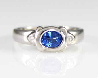 Sapphire and Diamond 18k White Gold Bezel Set Ring