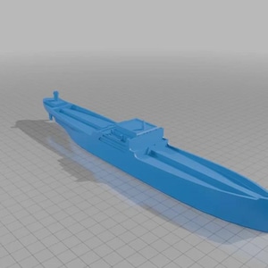 May include: A light blue model ship, with a long, rectangular hull, a raised central structure, and a detailed bow. The model is set against a grid background.
