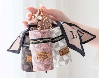 Minibolso llavero con forma de lápiz labial: bolsa cilíndrica con estampado de lujo