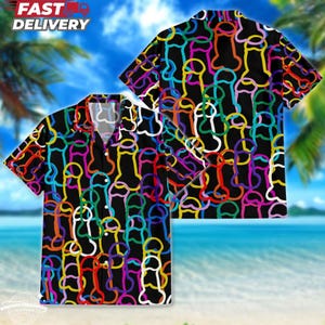 May include: Short-sleeved button-down shirt with a black background and a repeating pattern of colourful, stylised phallus shapes. The shirt features a classic collar and is displayed with a matching back view. The words "FAST DELIVERY" are visible.